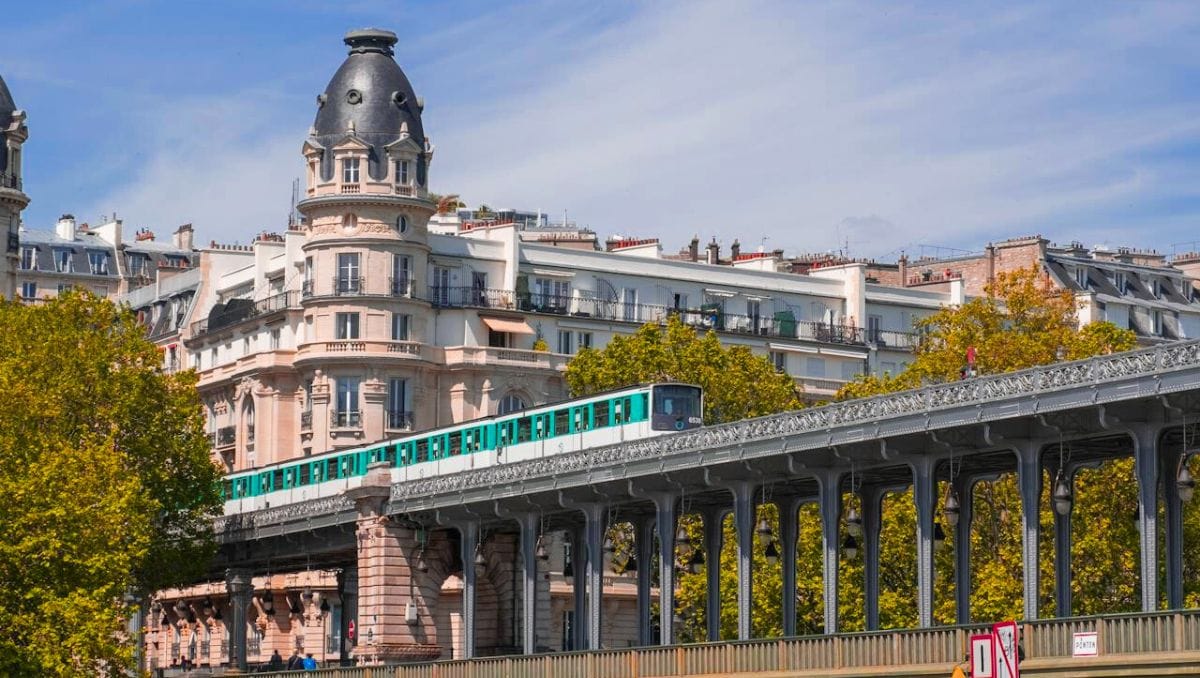 Getting Around Paris - A Subway Train Crossing Pont de Bir-Hakeim over Seine River in Paris