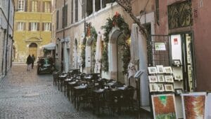 Cheap Hotels in Rome Charming Café Lined Street in Rome, Italy