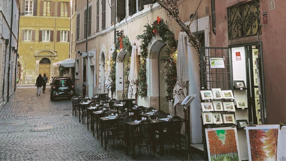 Cheap Hotels in Rome Charming Café Lined Street in Rome, Italy