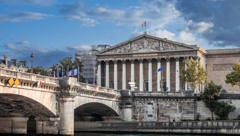 France Retirement Visa Explained - Elegant View of Palais Bourbon from the Seine