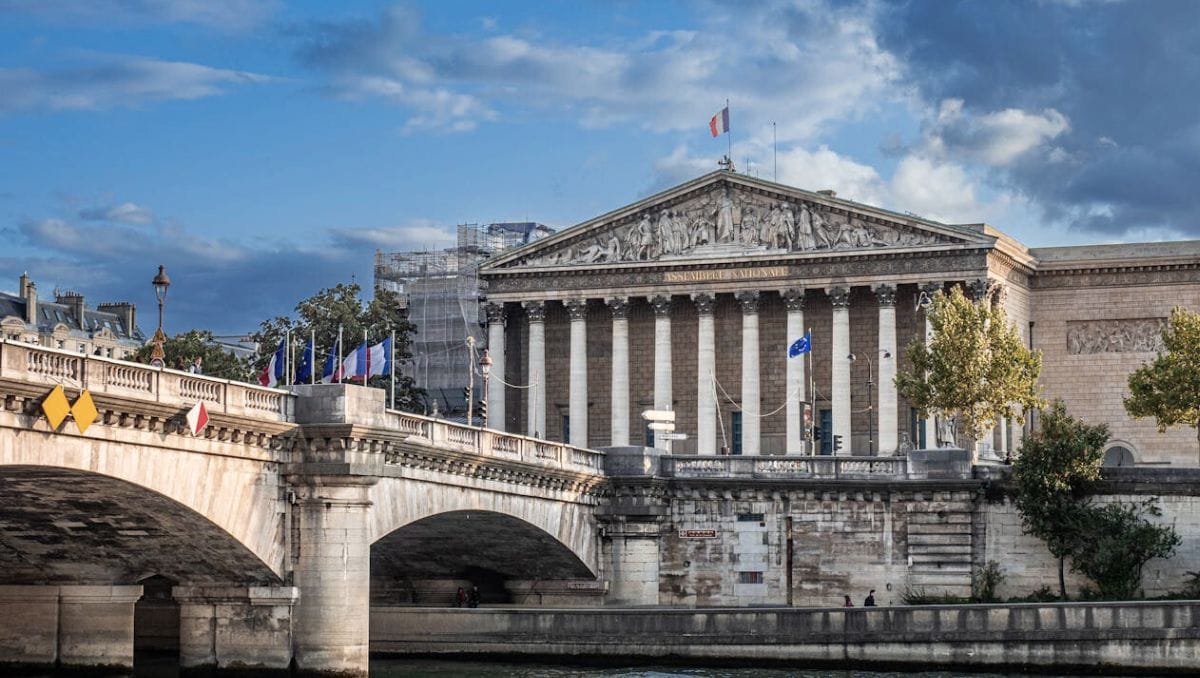 France Retirement Visa Explained - Elegant View of Palais Bourbon from the Seine