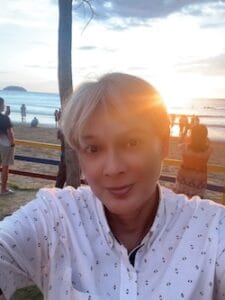 Leslie on the beach while the sunset