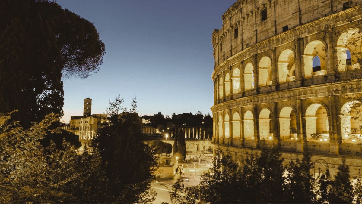 Rome Travel Guide Things to do - Twilight View of the Illuminated Colosseum Rome